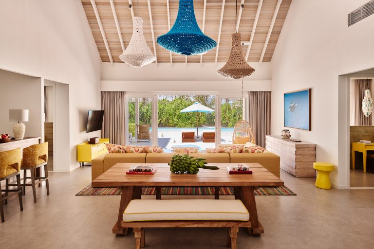 2103_Finolhu Maldives_Two-Bedroom Beach Pool Villa - Living Area with outdoor view