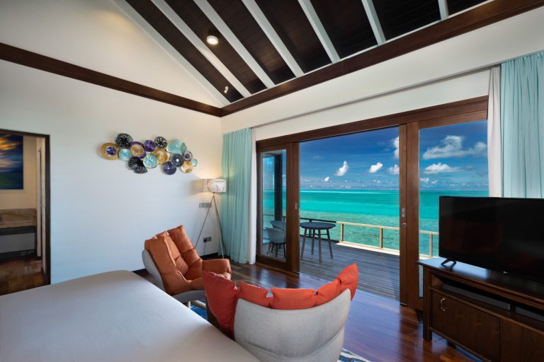 ATMOSPHERE KANIFUSHI - WATER VILLA - BEDROOM WITH VIEW 2