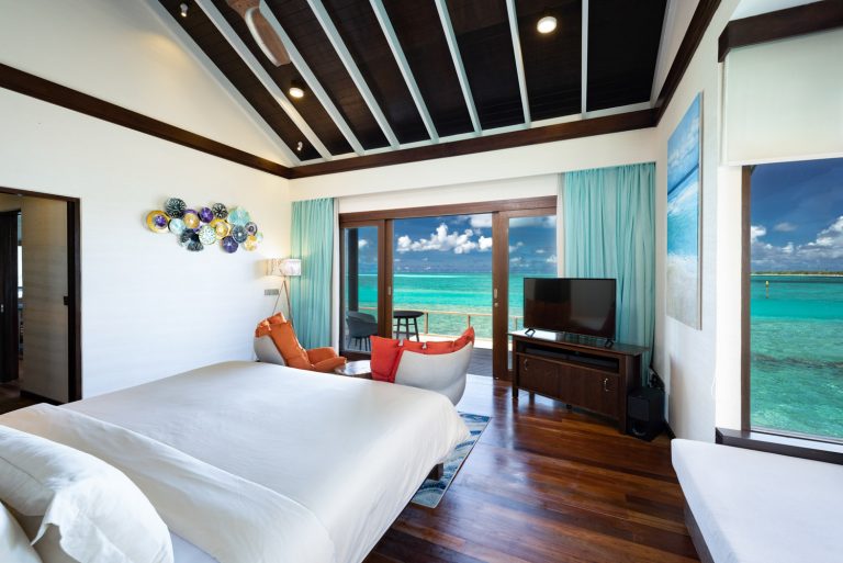 ATMOSPHERE KANIFUSHI - WATER VILLA - BEDROOM WITH VIEW