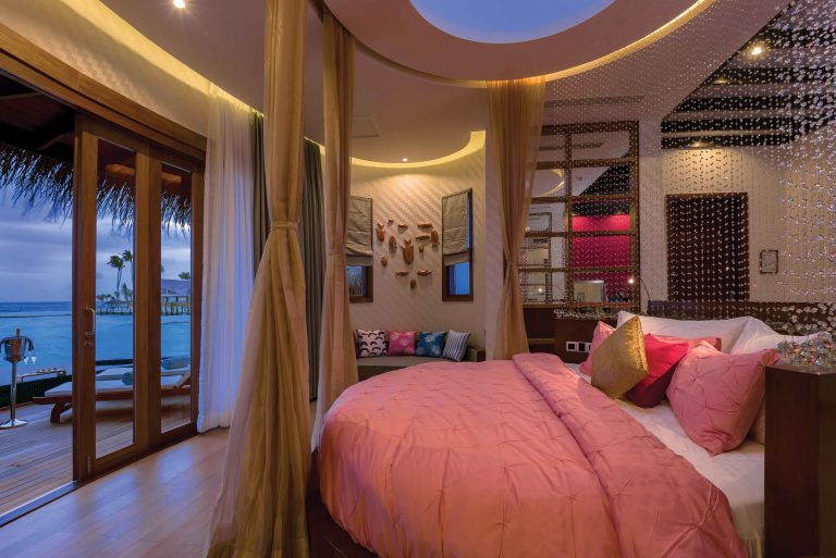 Honeymoon-Water-Suites-Pool-Bedroom-Side-View