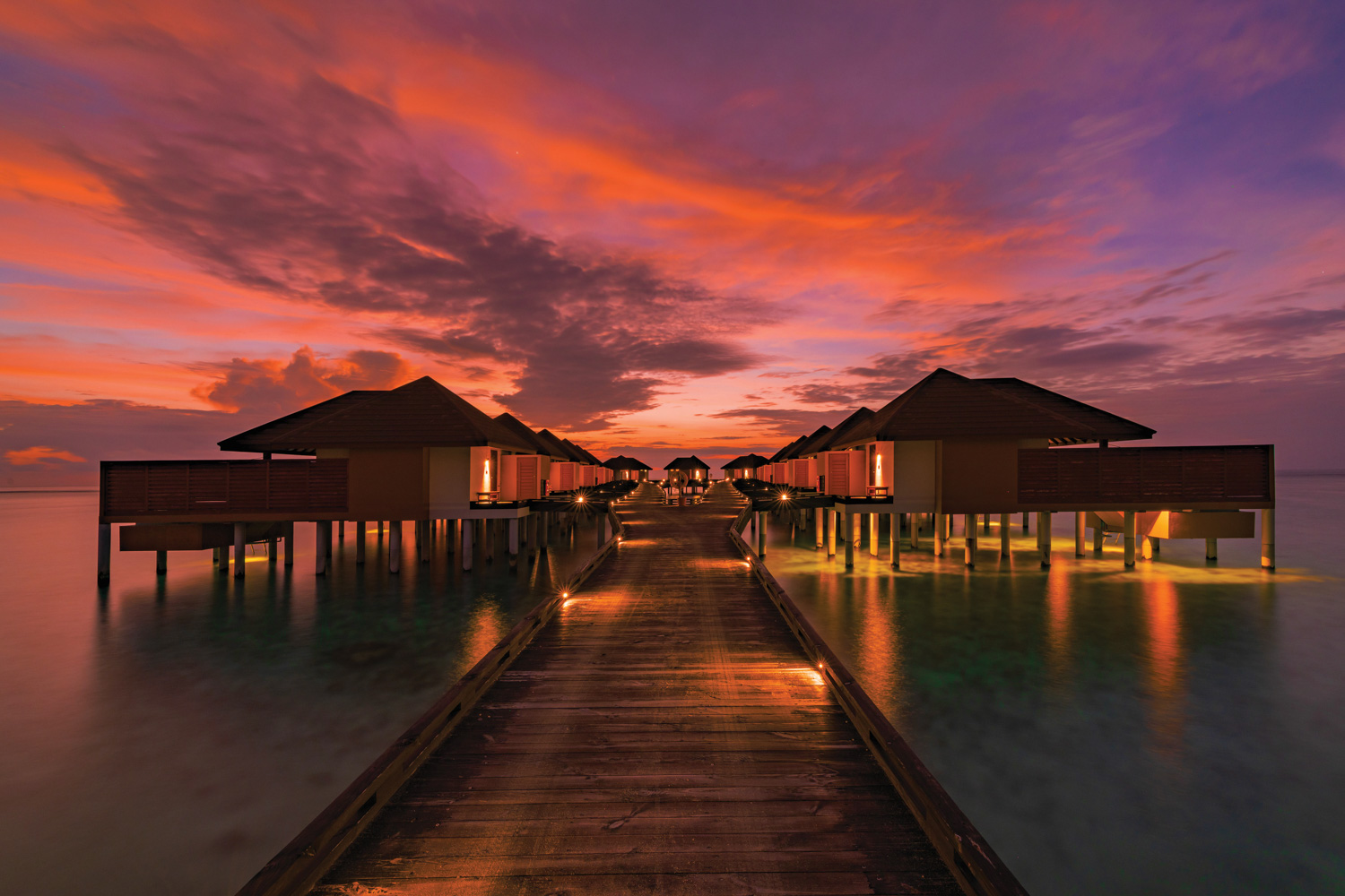 VARU BY ATMOSPHERE - AERIALS AND GENERIC - WATER VILLA JETTY AT SUNSET